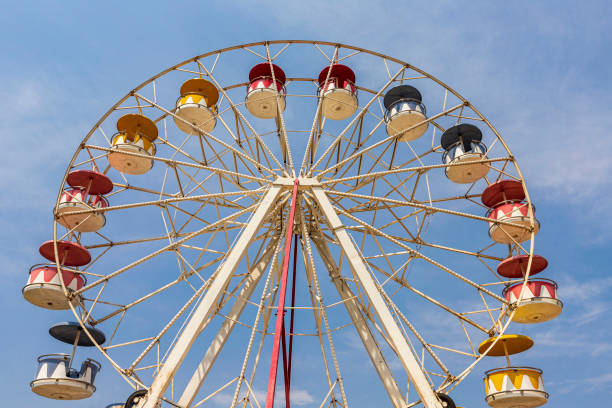 istock Colorful giant wheels in park amusement 1344334763