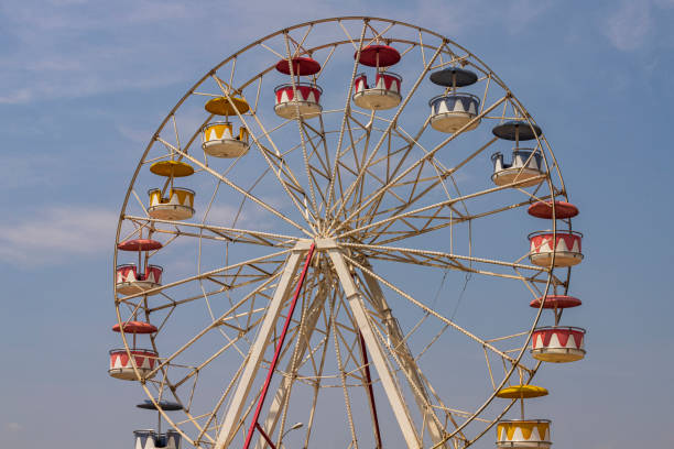 istock Colorful giant wheels in park amusement 1344334839