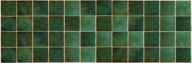 Photo of Green ceramic tile background. Old vintage ceramic tiles in green to decorate the kitchen or bathroom