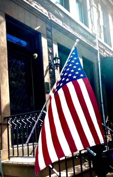 istock American Flag Attached to Railing 1344342420