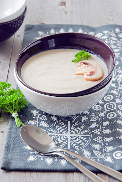 Potato cream soup with champignons