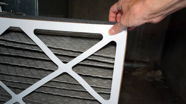 istock Removing Old Furnace Filter 1344344660
