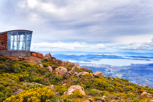 Top of Mt Wellington over Hobart city - the capital of Tasmania in Australia. Windy lookout observation platform and pavilion overlooking Derwent river valley.