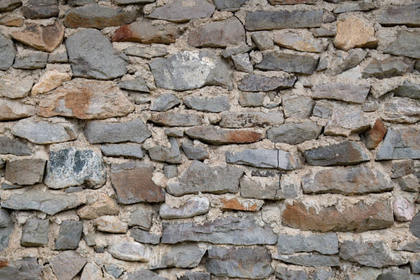 istock Old antique stone masonry building exterior 1344346800