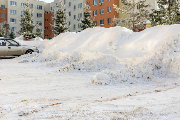 istock courtyard of a multi-storey building with snow-covered parking spaces 1344348534