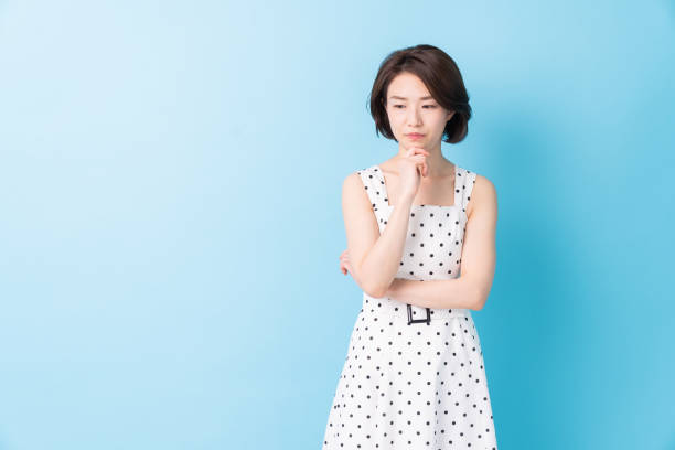 istock attractive asian woman who thinks 1344350573