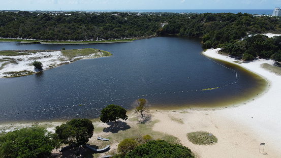 salvador, bahia, brazil - september 16, 2021: aerial view of Lagoa do Abaete, in the neighborhood of Itapua in the city of Salvador. The lake is located in the Metropolitan Park of Abaete.