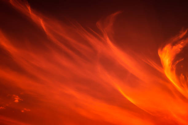 sunset cloudscape with fiery sky at dusk - neon orange imagens e fotografias de stock