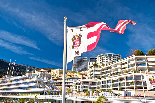 Yachts in bay near houses and hotels, La Condamine, Monte-Carlo, Monaco, Cote d'Azur, French Riviera.