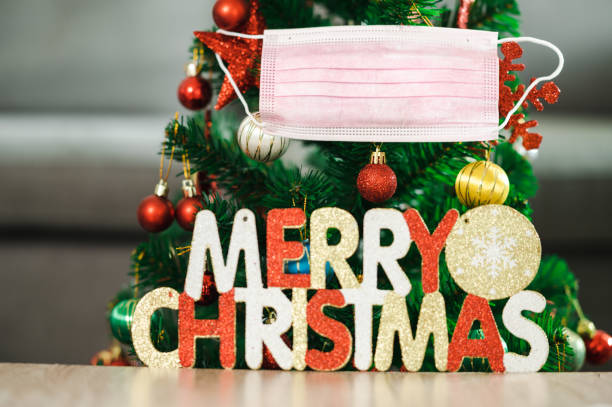 istock Beautifully Christmas Decorated bokeh background Home Interior With A Christmas Tree 1344376241