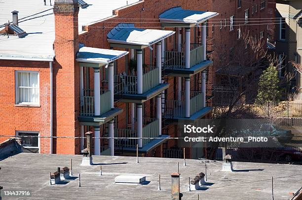 Row Of Apartments In An Urban City Setting Stock Photo - Download Image Now - Adult, Apartment, City