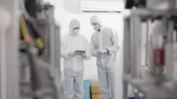 istock Quality inspectors is checking a masks in factory. 1344379539