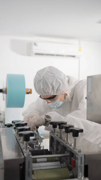 istock Quality inspectors is checking a masks in factory. 1344379554