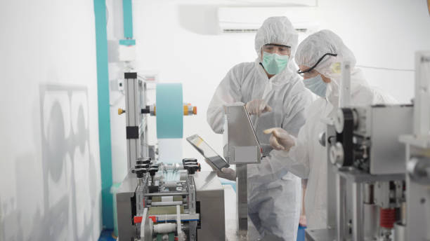 istock Quality inspectors is checking a masks in factory. 1344379598