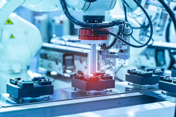 istock Automatic industrial robotic robot working, industry 4.0 and technology concept 1344380228