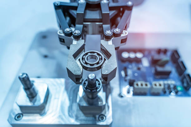 istock Automatic industrial robotic robot working, industry 4.0 and technology concept 1344380376