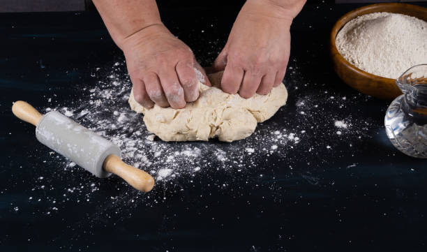 istock kneading homemade bread with flour, water and salt 1344383519