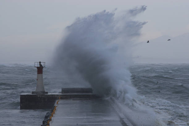 istock storm on Kalk Bay's harbour, Cape Town, False Bay, South Africa 1344384456