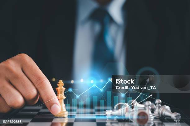 Businessman In Black Suite Sitting Player Chessmeaning Of Planning And Strategy Ecision Achievement Goal Concept Of Business Stock Photo - Download Image Now