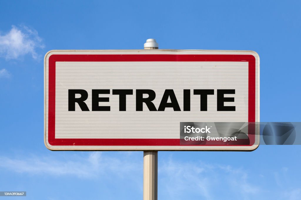 Retirement - French entry city sign A French entry city sign against a blue sky with written in the middle in French "Retraite", meaning in English "Retirement". Retirement Stock Photo