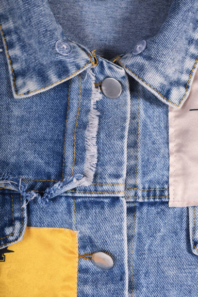 istock Old blue jeans background and texture close up.Denim seam. 1344395712