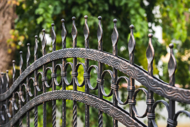 Wrought Iron Fence Metal fence wrought iron stock pictures, royalty-free photos & images