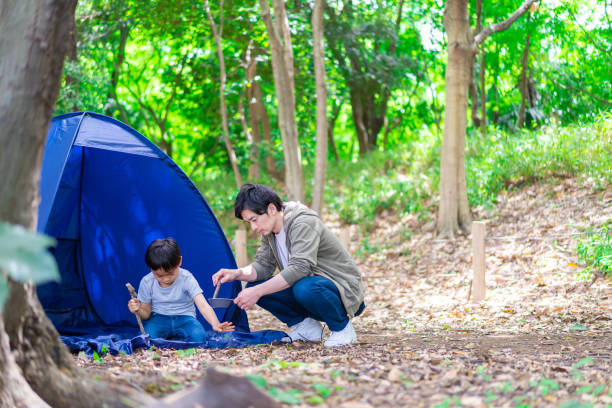 istock A boy enjoying the outdoors with his father 1344401717