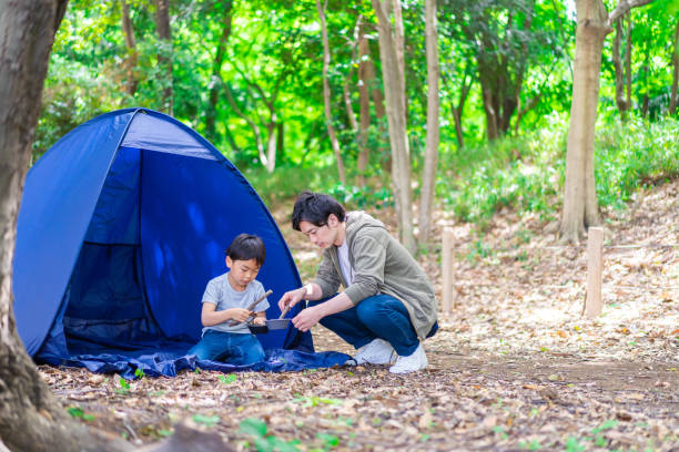 istock A boy enjoying the outdoors with his father 1344401720