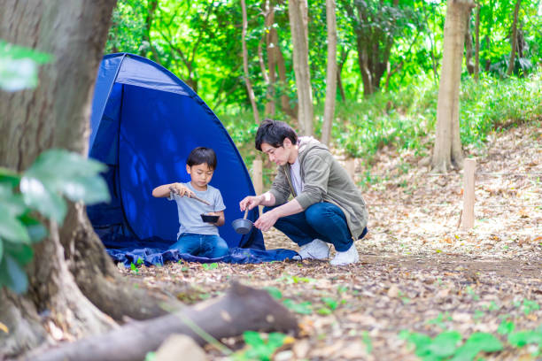 istock A boy enjoying the outdoors with his father 1344401727