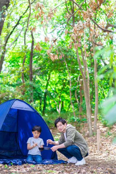 istock A boy enjoying the outdoors with his father 1344401734