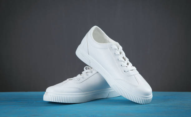 istock Pair of new stylish white sneakers. 1344403096