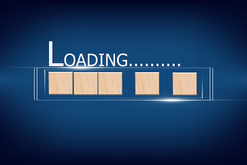 wood cube block in Loading bar on blue background