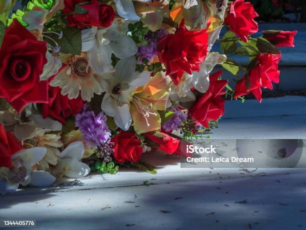 Flowers On A Tomb Cemetery Graveyard Stock Photo - Download Image Now - Bouquet, Day Of The Dead, Cemetery