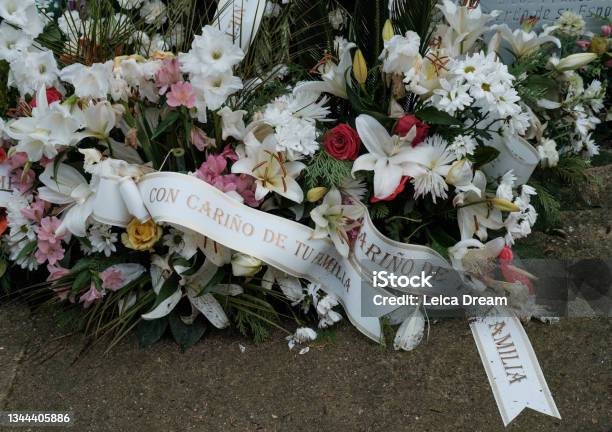 Wreath Of Flowers Cemetery Graveyard Stock Photo - Download Image Now - Day Of The Dead, Spain, Ancient