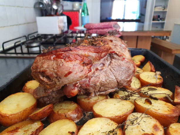 istock Lamb roast with potatoes and rosemary 1344406946