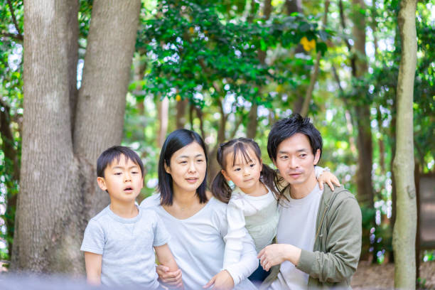 istock Family observing nature in the forest 1344408012