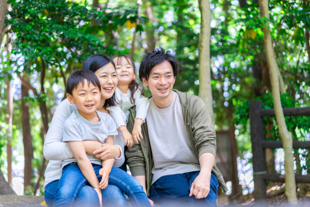 istock Family observing nature in the forest 1344408023