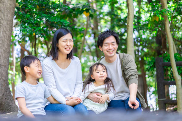 istock Family observing nature in the forest 1344408026