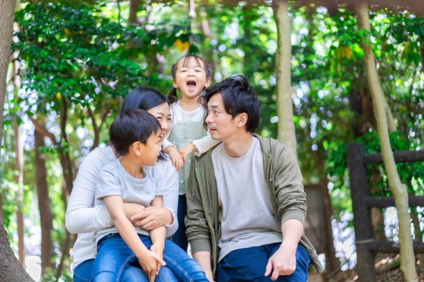 istock Family observing nature in the forest 1344408029