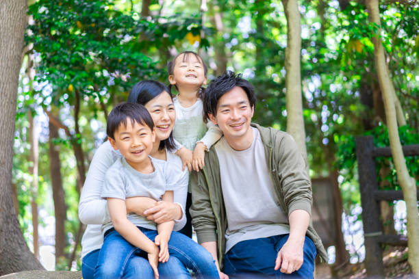 istock Family observing nature in the forest 1344408030