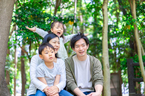 istock Family observing nature in the forest 1344408036