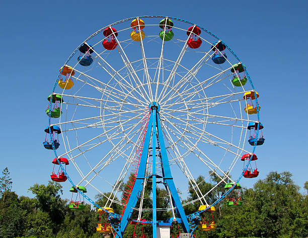 Ferris Wheel A colourful ferris wheel. Front view ferris wheel stock pictures, royalty-free photos & images