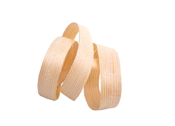 istock wooden sawdust slice isolated on the white 1344409327