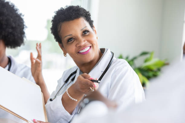 istock Mature Medical Professional 1344410696