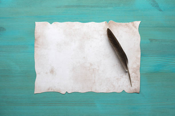 istock Blank Old Brown Paper on Green Wooden Background 1344411468