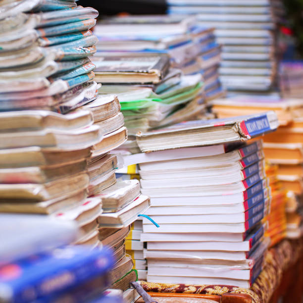 istock Stacks of old books in the library 1344411902