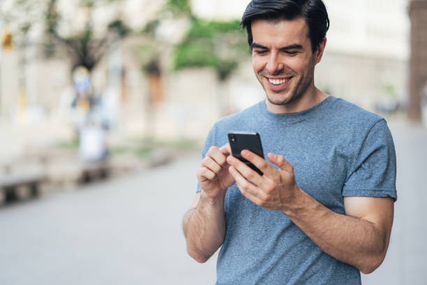 istock Texting on the street 1344412198