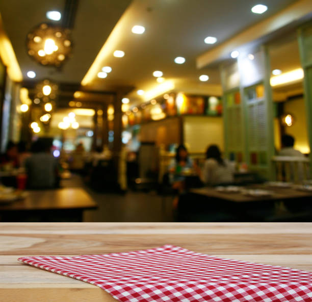 istock tablecloth and customer at restaurant blur background with bokeh 1344412514