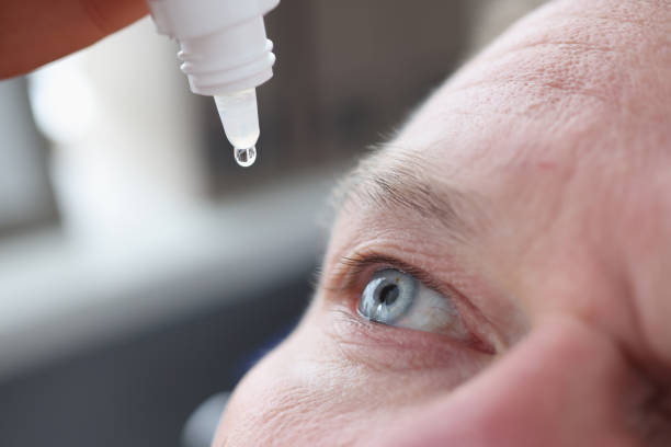 istock Young caucasian man shot in head with eye drops 1344412622