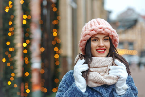 istock Stunning lady in coat walking at the city 1344412834